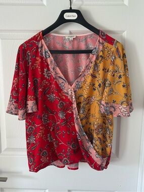 Umgee Floral Colorblock Wrap Blouse in Red, Mustard & Pink